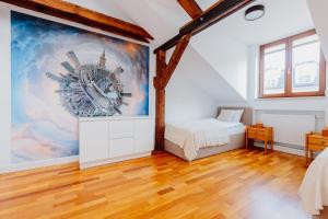Posteľ alebo postele v izbe v ubytovaní Atticus Apartments