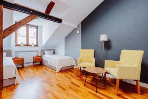 Posteľ alebo postele v izbe v ubytovaní Atticus Apartments