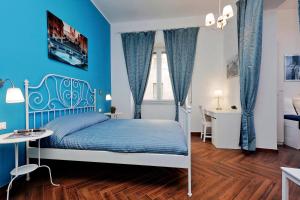 Tempat tidur dalam kamar di Domus Ponte Milvio