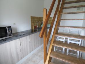 Kuchyň nebo kuchyňský kout v ubytování Domaine La Synchronicité - Gîte et Chambres d'Hôtes