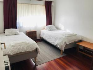 Cama ou camas em um quarto em TOISGA Apartment