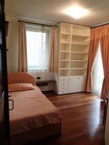 Postel nebo postele na pokoji v ubytování B&B Dolce vista al lago Lugano