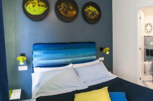 Postel nebo postele na pokoji v ubytování B&B Amalfè