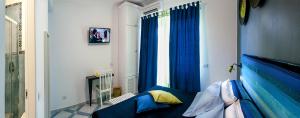 TV a/nebo společenská místnost v ubytování B&B Amalfè