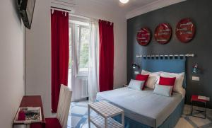 Postel nebo postele na pokoji v ubytování B&B Amalfè