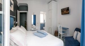 Postel nebo postele na pokoji v ubytování B&B Amalfè