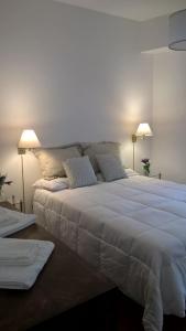 Een bed of bedden in een kamer bij Alto Palermo, ,espacio y luz