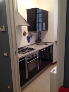 A kitchen or kitchenette at Chiossetto House Még 31 kép