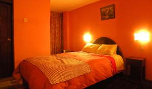Cama o camas de una habitación en Hotel Margarita