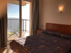 A bed or beds in a room at President A-9