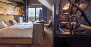 Postel nebo postele na pokoji v ubytování Berggasthof & Hotel Sennhütte