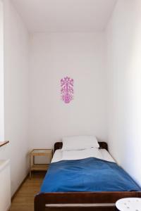 Posteľ alebo postele v izbe v ubytovaní Folk Hostel