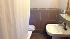 Kúpeľňa v ubytovaní Villa Evisa
