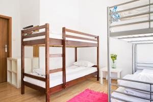 Posteľ alebo postele v izbe v ubytovaní Folk Hostel