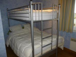 
A bunk bed or bunk beds in a room at Apartment Cap d' Ail
