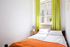 Posteľ alebo postele v izbe v ubytovaní Folk Hostel