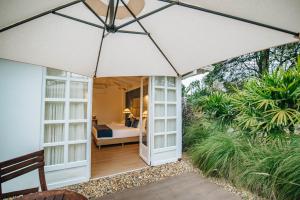 Κήπος έξω από το Hotel Boutique El Triángulo