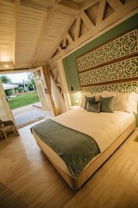 Ένα ή περισσότερα κρεβάτια σε δωμάτιο στο Hotel Boutique El Triángulo