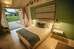 Ένα ή περισσότερα κρεβάτια σε δωμάτιο στο Hotel Boutique El Triángulo