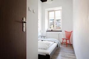 Posteľ alebo postele v izbe v ubytovaní Folk Hostel