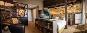 TV a/nebo společenská místnost v ubytování Berggasthof & Hotel Sennhütte