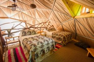 Un pat sau paturi într-o cameră la Cascada de las Animas