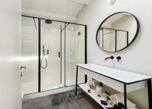 a bathroom with a sink and a mirror at A.D. 1768 Boutique Hotel in Ragusa +59 photos