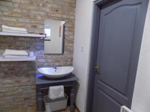 Kúpeľňa v ubytovaní Koller Apartmanház