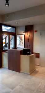 The lobby or reception area at Platanos Rooms