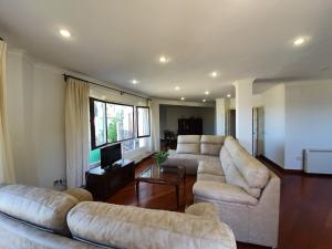 Posezení v ubytování Apartamento Mirador del Tajo + 28 fotografií