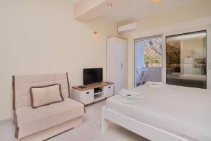 Ένα ή περισσότερα κρεβάτια σε δωμάτιο στο Sea Star Luxury Apartment