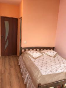 Postel nebo postele na pokoji v ubytování COMMUNE hotel