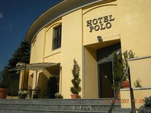 a hotel pollo building with stairs in front of it at Polo Hotel in Usmate Velate +105 photos