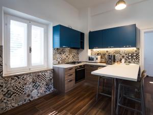 Kuchyň nebo kuchyňský kout v ubytování B&B VILLA TOZZA
