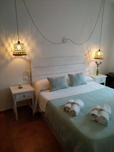 Hostal Sa Posada Set Cales客房内的一张或多张床位