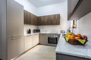 Cucina o angolo cottura di Sunny Modern Apartments