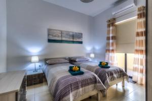 Letto o letti in una camera di Sunny Modern Apartments