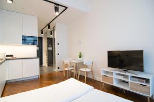 Μια τηλεόραση ή/και κέντρο ψυχαγωγίας στο Baltic Accommodation 1 - Rumbi 4-36