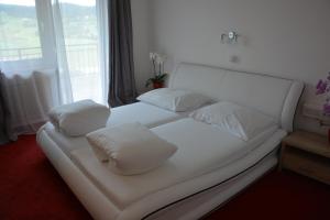 Postel nebo postele na pokoji v ubytování Hotel Böhmerwaldhof