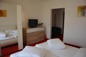 Postel nebo postele na pokoji v ubytování Hotel Böhmerwaldhof