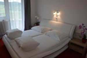 Postel nebo postele na pokoji v ubytování Hotel Böhmerwaldhof