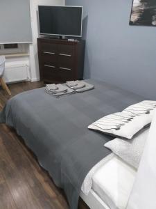 Una cama o camas en una habitación de Studio Fibra Doppio