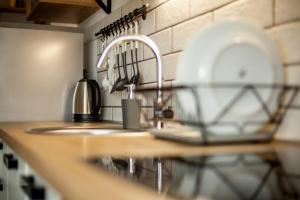 Kuchyň nebo kuchyňský kout v ubytování Apartment Katalea