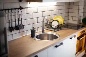 Kuchyň nebo kuchyňský kout v ubytování Apartment Katalea