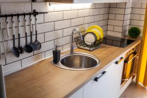 Kuchyň nebo kuchyňský kout v ubytování Apartment Katalea