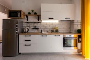 Kuchyň nebo kuchyňský kout v ubytování Apartment Katalea