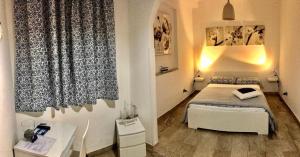Postel nebo postele na pokoji v ubytování B&B Scilla Mare