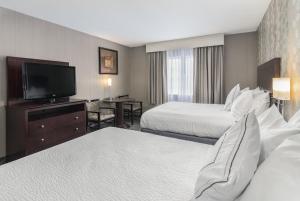 Postel nebo postele na pokoji v ubytování Best Western Concord Inn and Suites