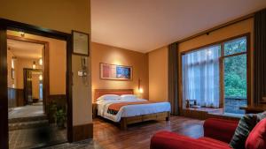 Postel nebo postele na pokoji v ubytování Moondance Boutique Resort
