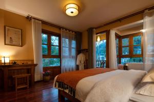 Postel nebo postele na pokoji v ubytování Moondance Boutique Resort